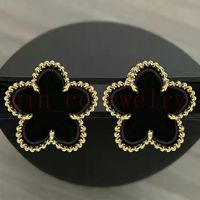 Gold and black agate earrings